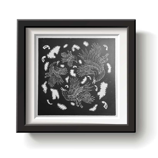 Framed artwork with black and white crow design on a white background