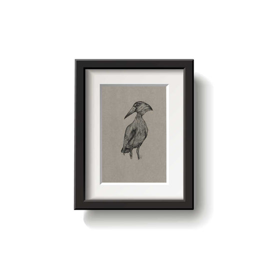 Framed artwork of a bird on a beige background