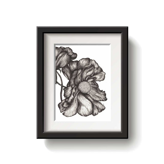 A framed flower drawing on a white background.