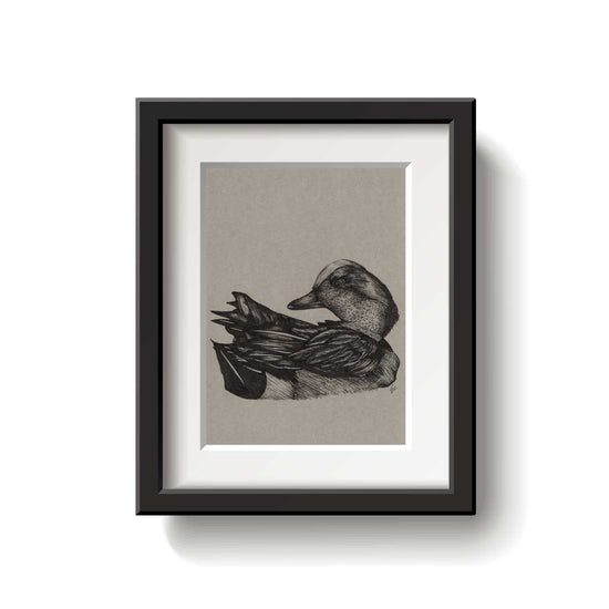 Framed artwork of a duck on a beige background