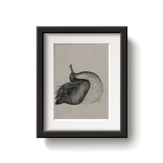 Framed black and white artwork of a bird on a beige background