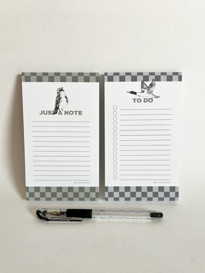 Notebook with 'Just Note' and 'To Do' pages on a light gray background