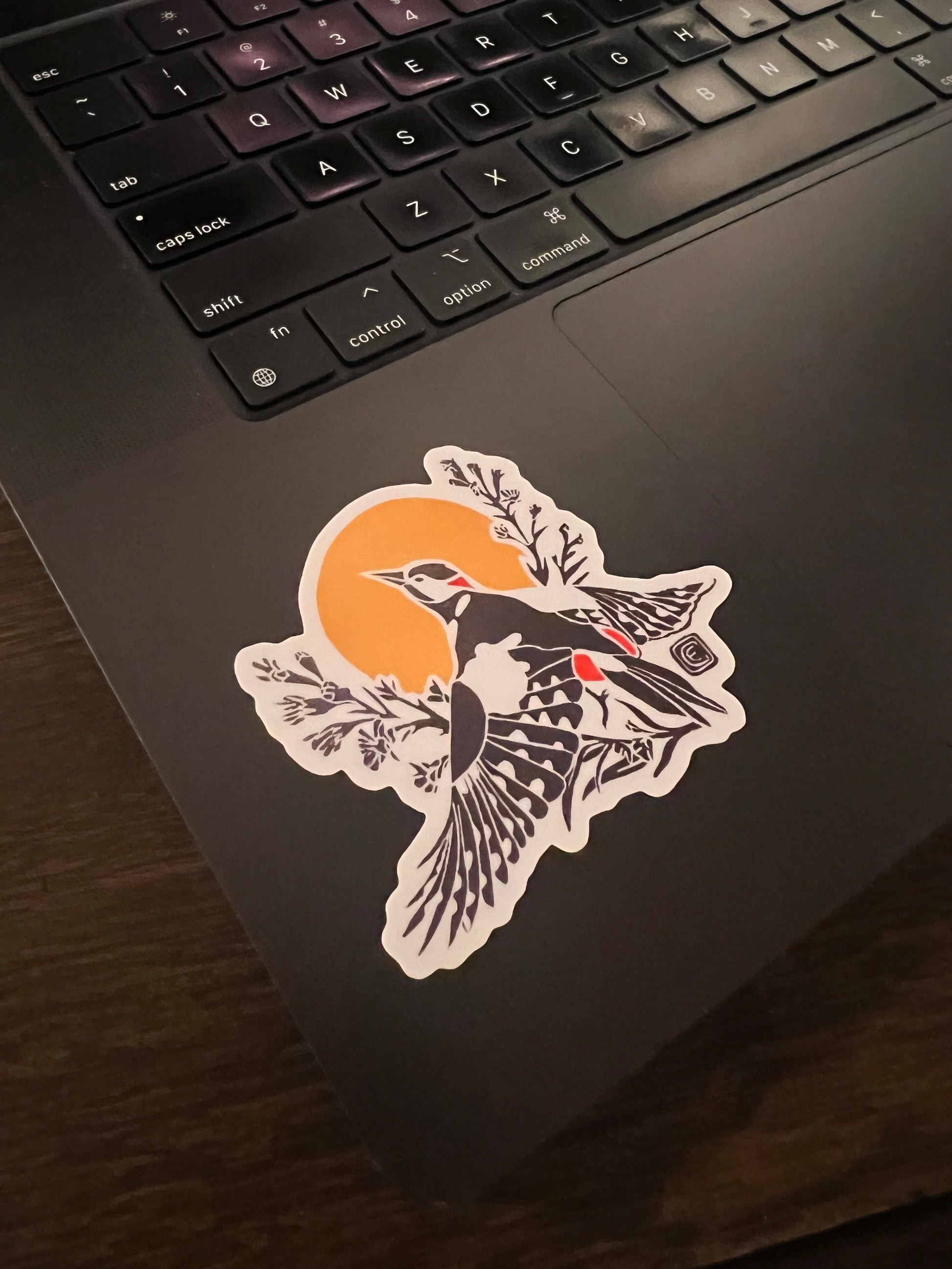 Flying Woodpecker Lino Print Sticker by Emily Ciecka