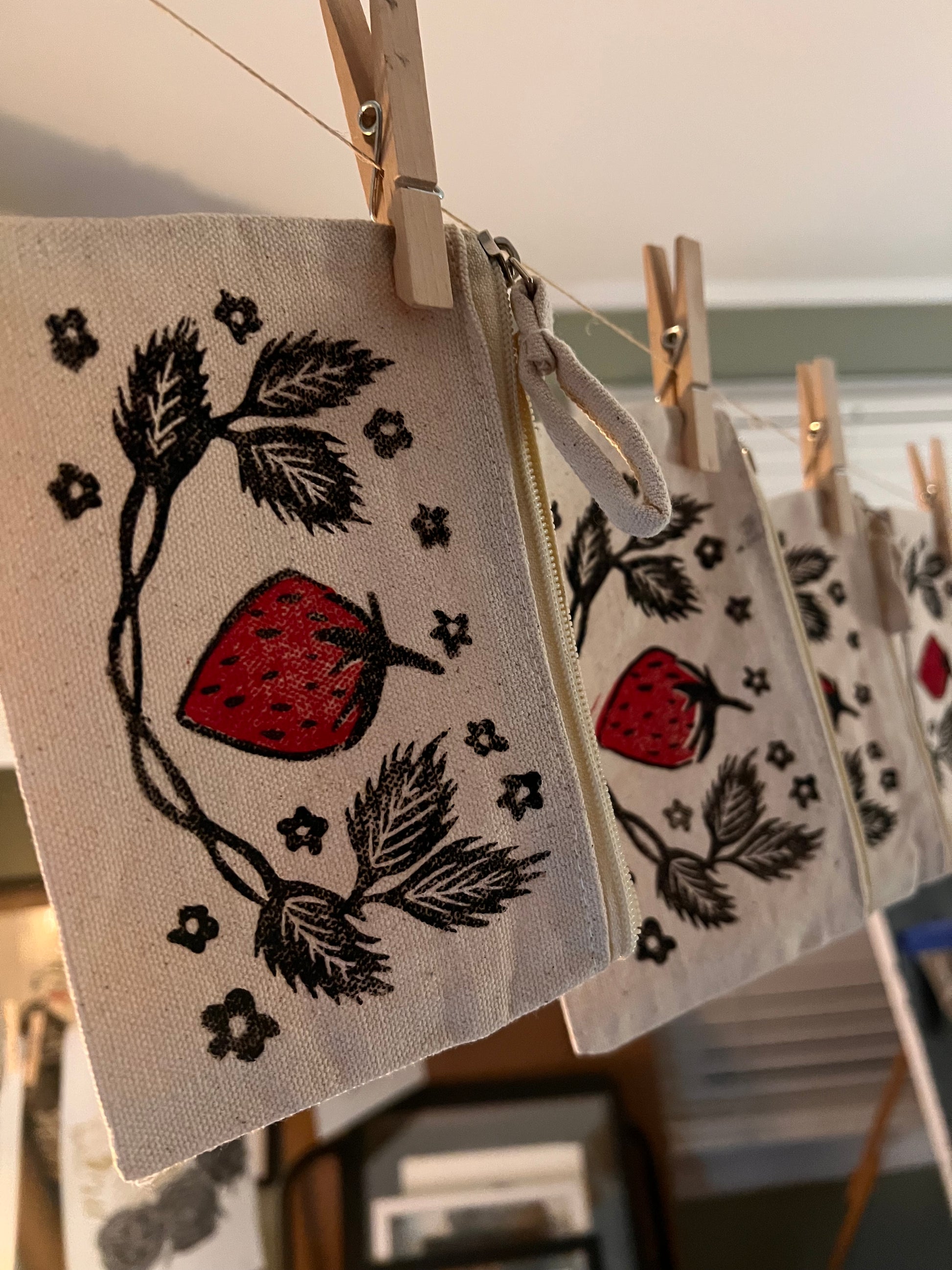 Strawberry Lino Print Coin Purse by Emily Ciecka