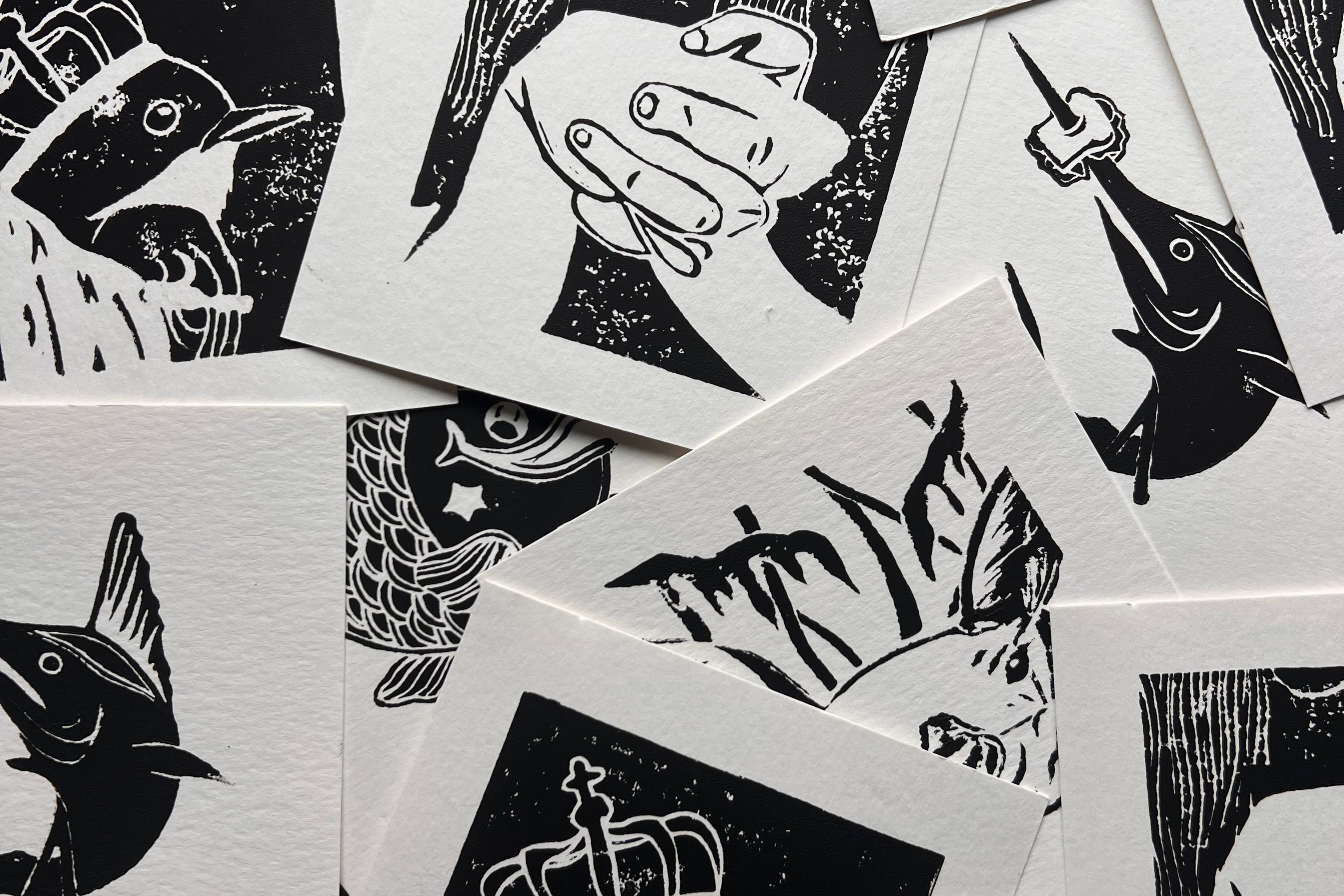 Collection of black and white illustrations on cards.