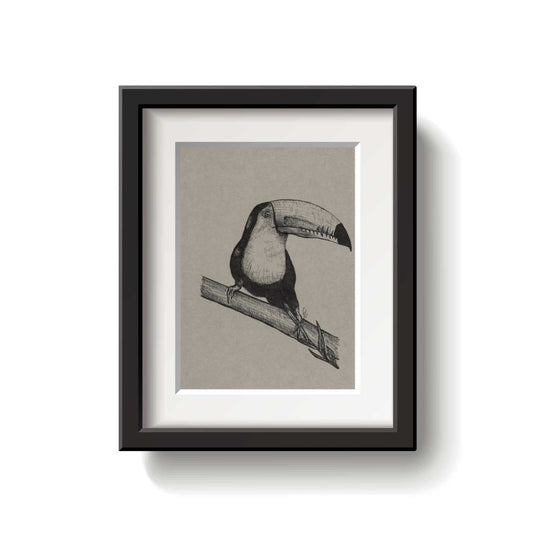 Framed artwork of a bird on a branch against a beige background