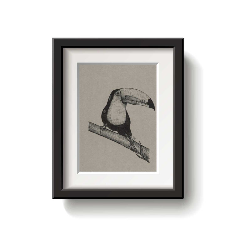 Framed artwork of a bird on a branch against a beige background