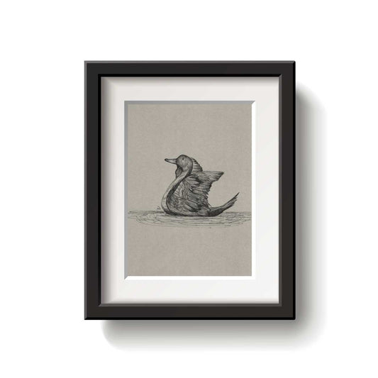 Framed artwork of a duck on a beige background