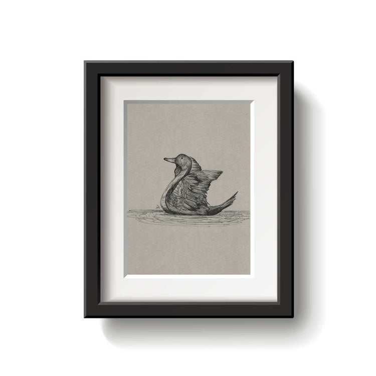 Framed artwork of a duck on a beige background