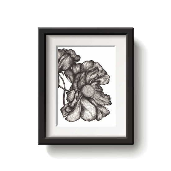 A framed flower drawing on a white background.