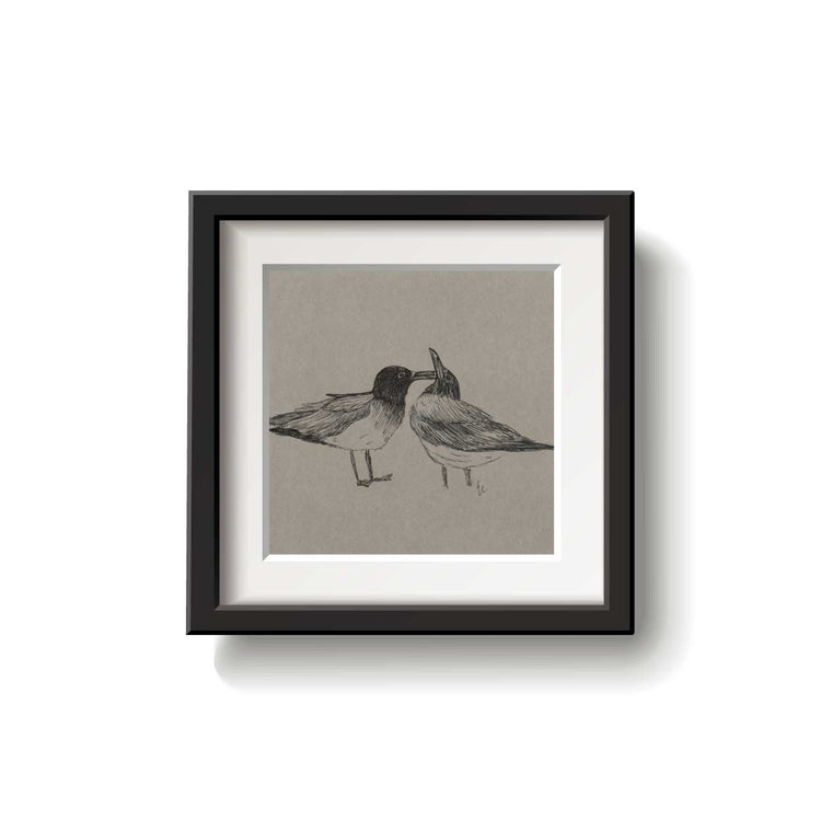 A framed bird drawing on a white background.