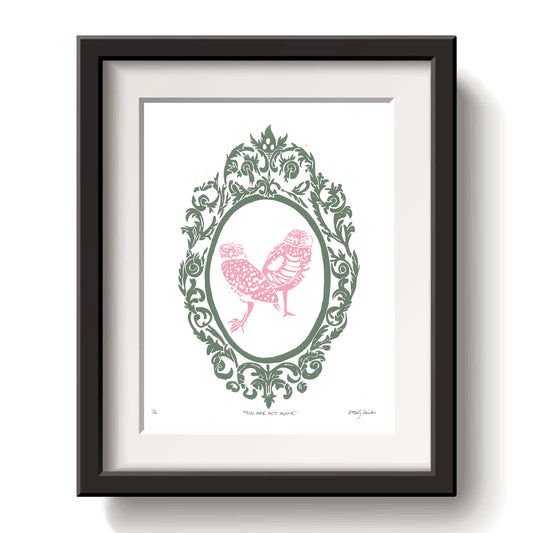 Framed artwork with a decorative burrowing owl design pink ink on a white background
